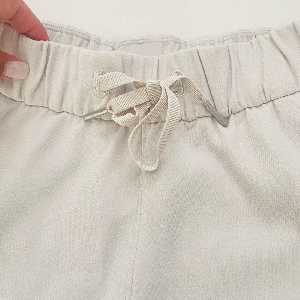 Lululemon On the Fly High Waist Cream Shorts - Picture 5 of 9